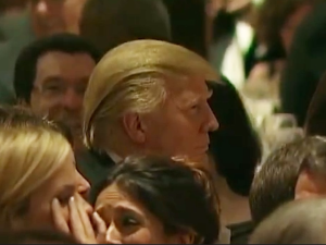 Trump having a grand time at the White House Correspondent's dinner in 2011